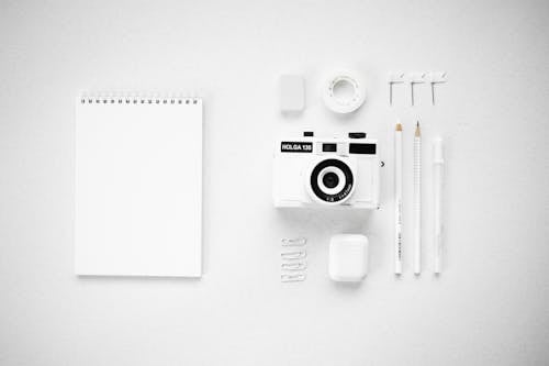 Composition of Camera and Office Supplies