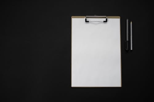 A Blank Paper on a Clipboard