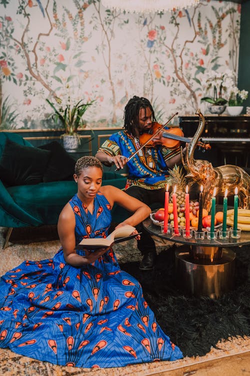 Man And Woman In Blue Kaftan And Dashiki Clothes