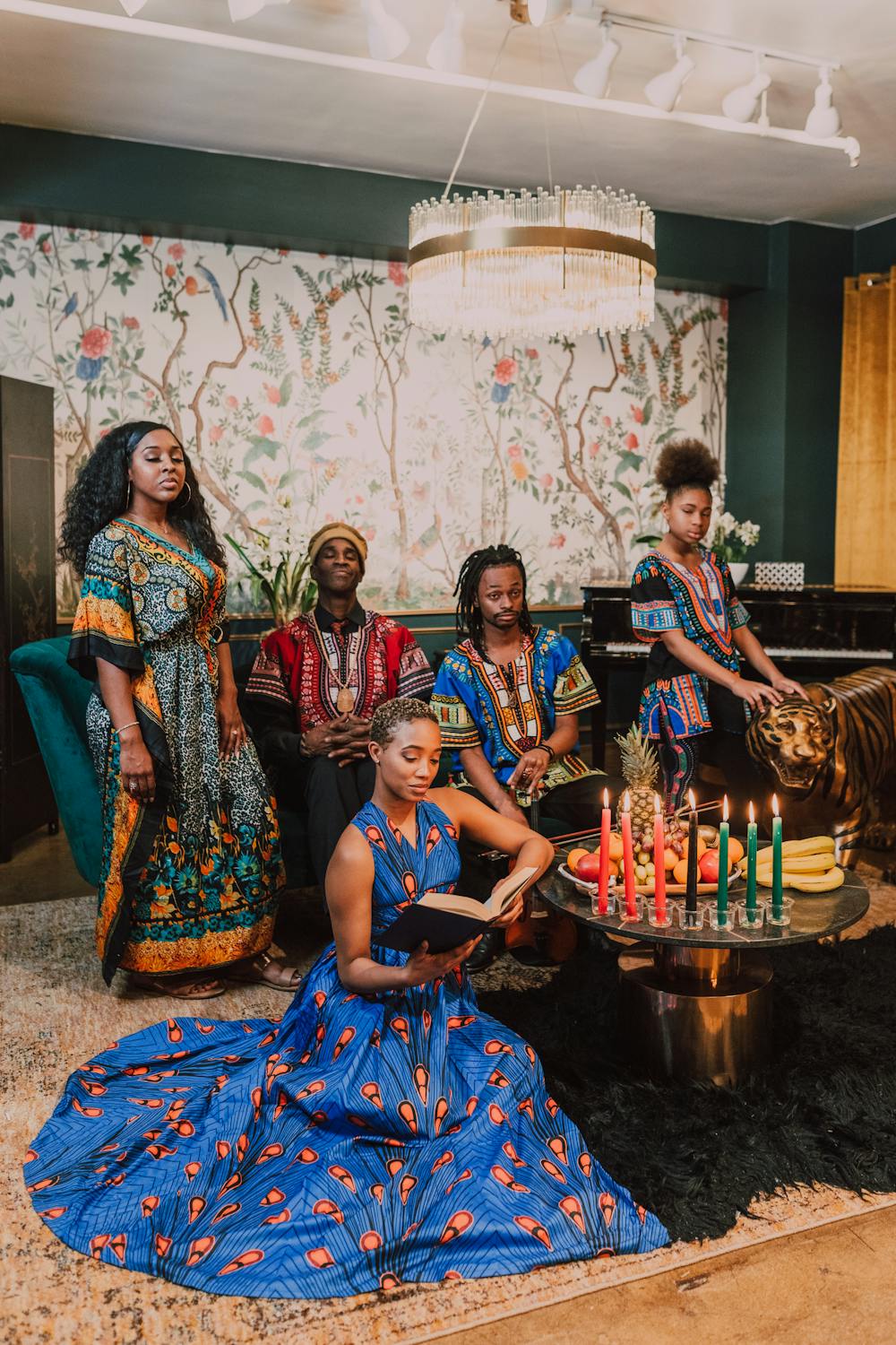 A family in traditional wear at a Kwanzaa celebration