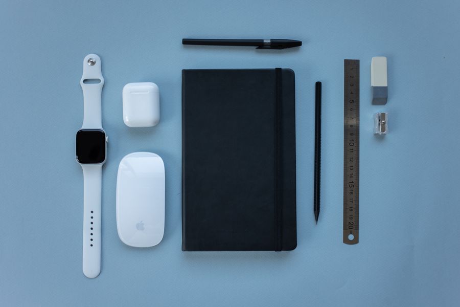 Flat lay of everyday tech gadgets and accessories