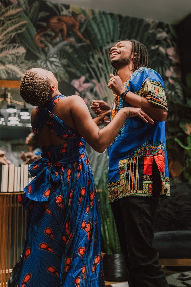 Man And Woman Enjoying While Dancing