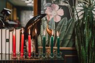 Lighted Candles on Glass Candle Holder