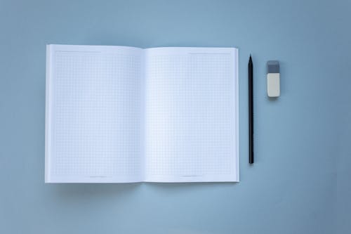 A Notebook on a Blue Surface 