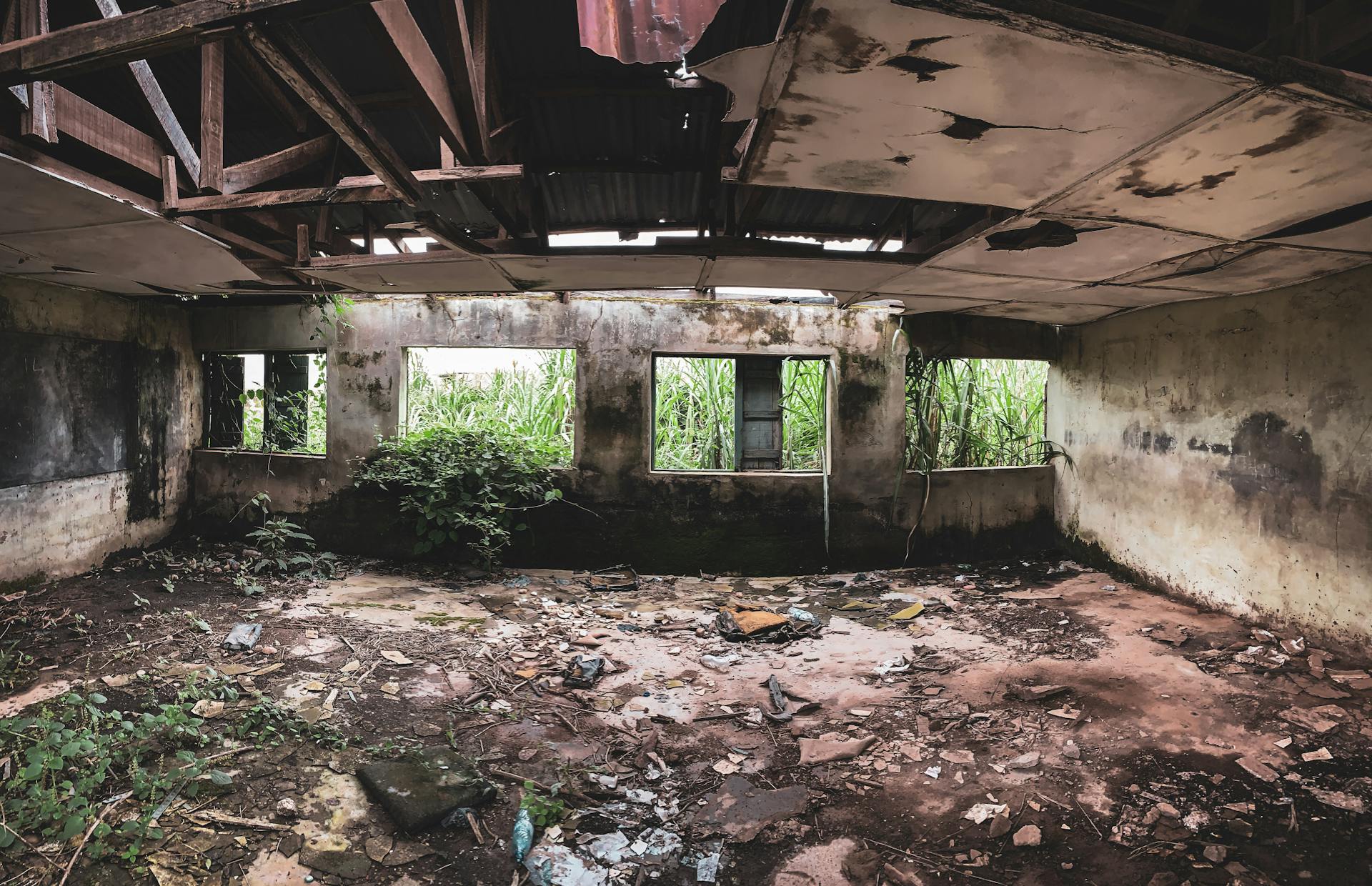 Abandoned House With Damaged Ceiling