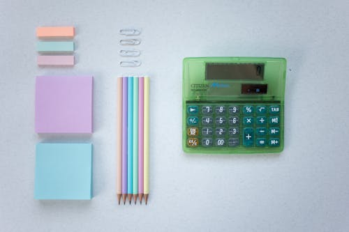 Free Writing Materials and a Calculator   Stock Photo