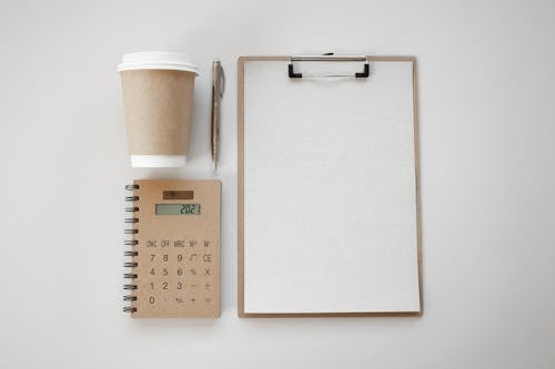 Free Stationery and Coffee on White Background Stock Photo