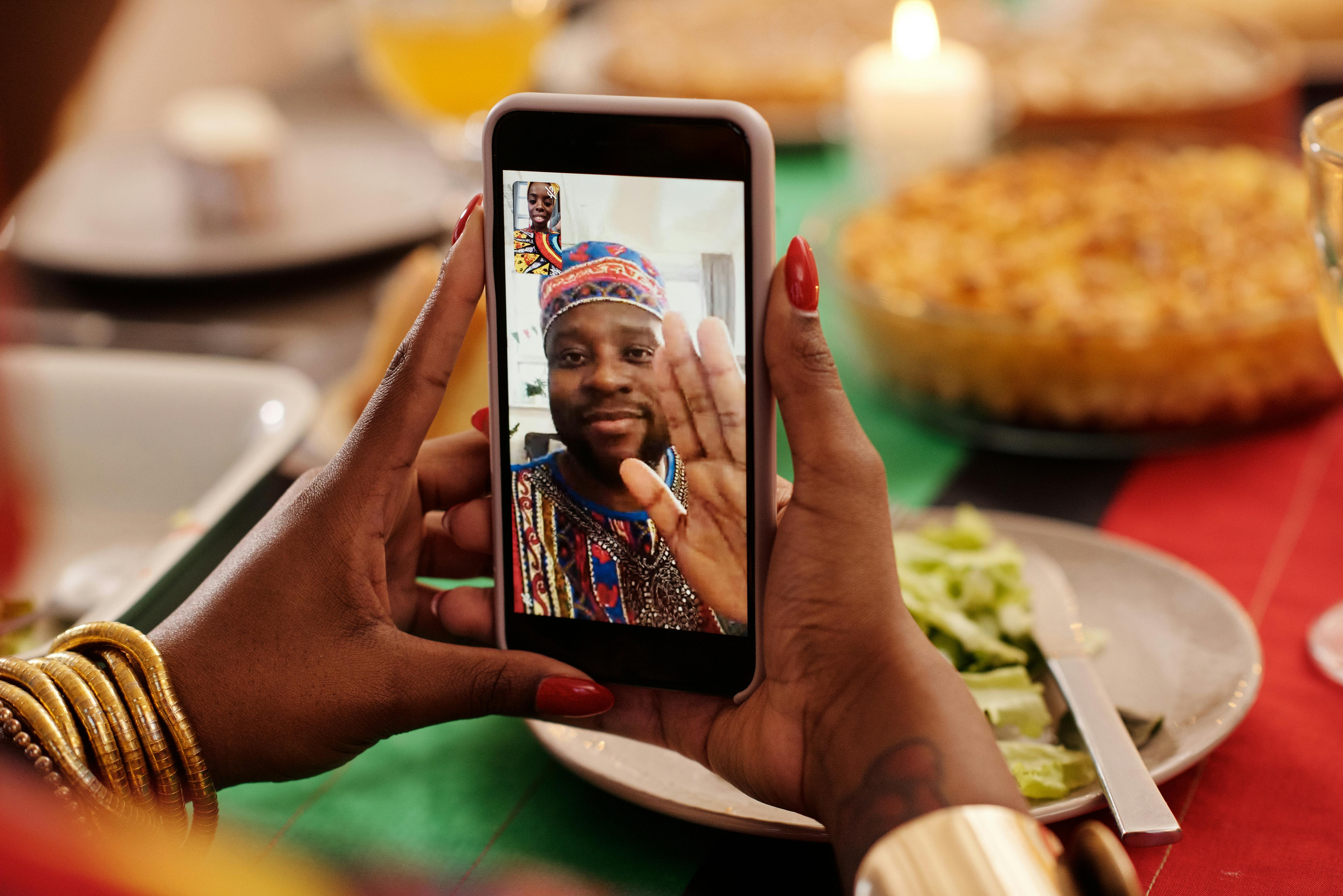 photo of person holding a phone