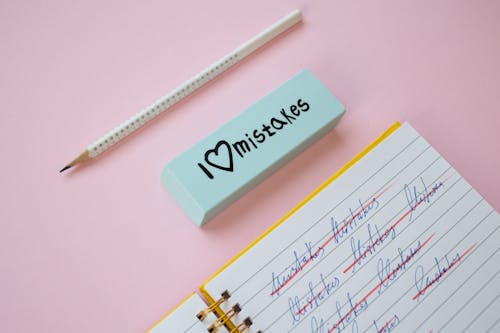 Free Pencil and Eraser on a Pink Surface Stock Photo