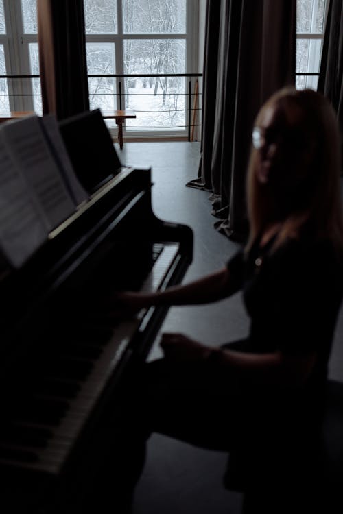 A Woman Playing Piano 