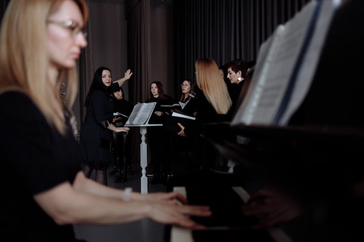 A Conductor Looking At The Pianist