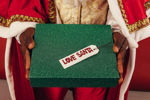 A close-up of Santa holding a green gift box with a 'Love Santa' tag, symbolizing holiday cheer.