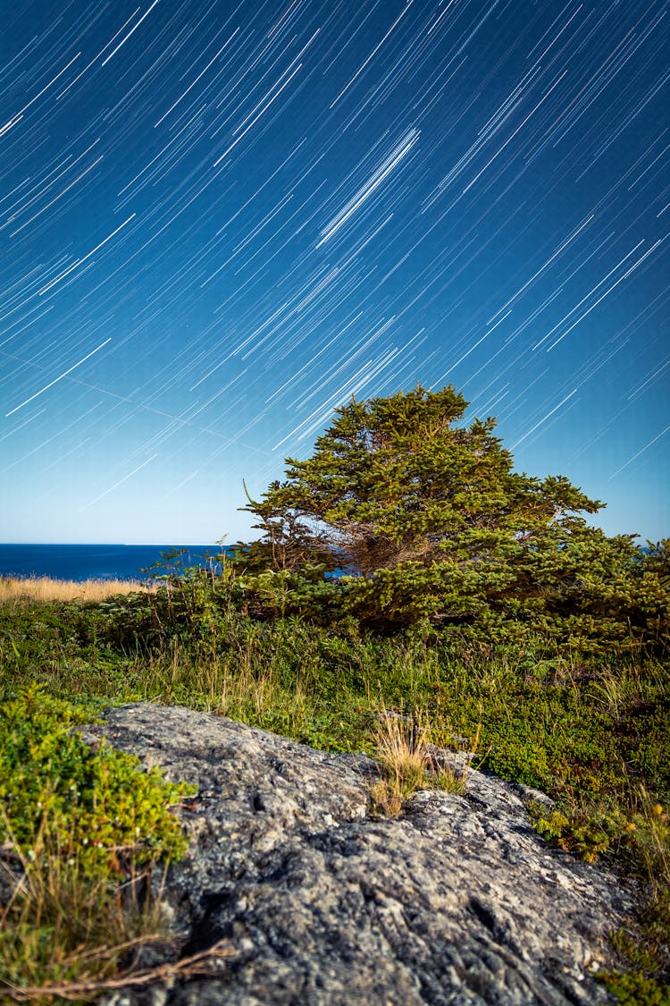 Rocky Coast And Sea Under Star Motion In Daytime