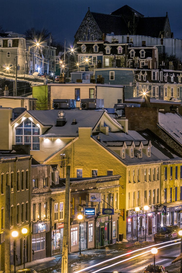 Road Against Residential House Facades In Night City