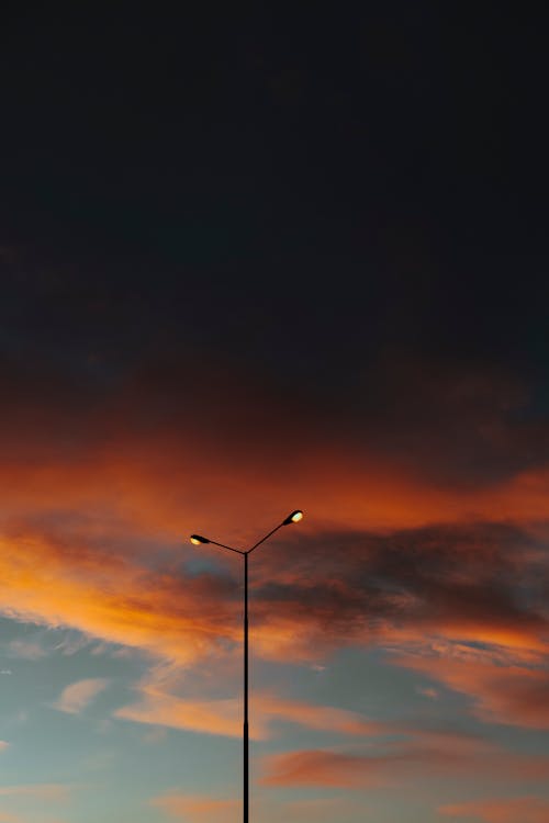 Free Silhouette of a Street Light during Sunset Stock Photo