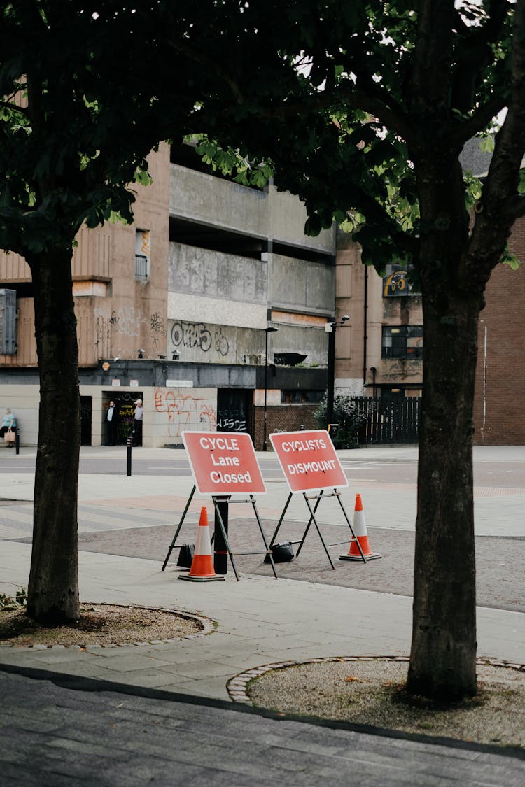 Cycle Lane Closed Signs Placed On Road In City