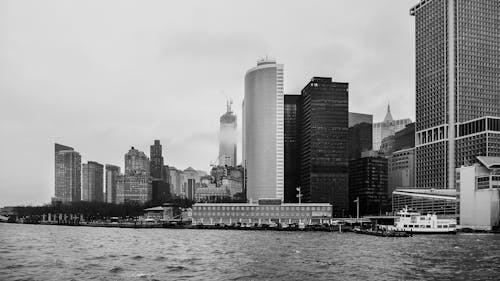 Grayscale Photo of City Buildings