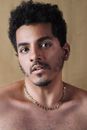 A Man Wearing a Chain Necklace