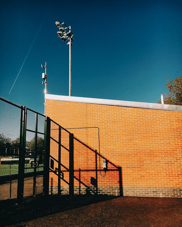 Brick Building Near Modern Sports Zone