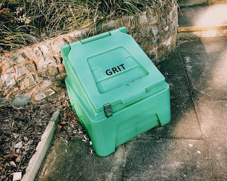 Container Near Stone Barrier On Street