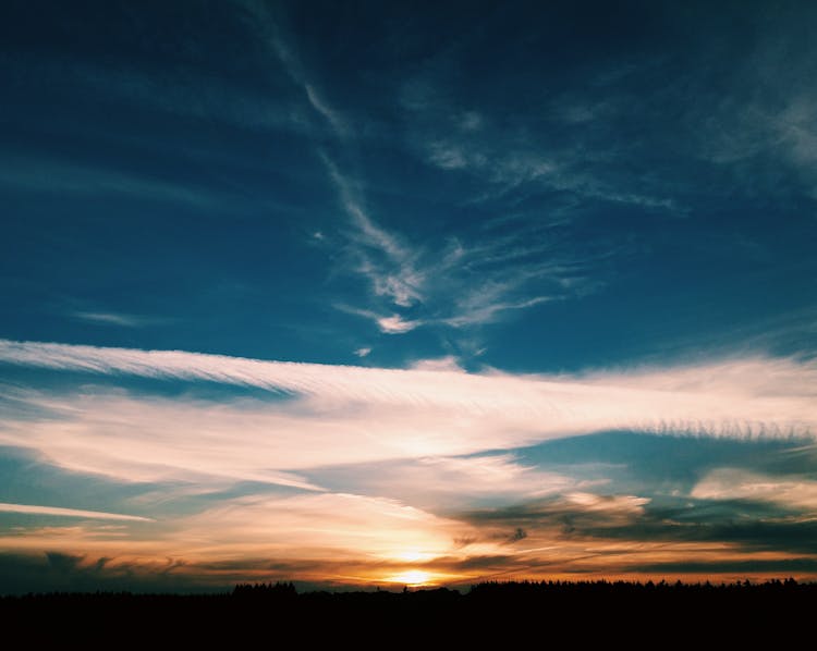 Bright Sunset Sky Over Countryside Area