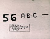 Surface with numbers and letters for private parking