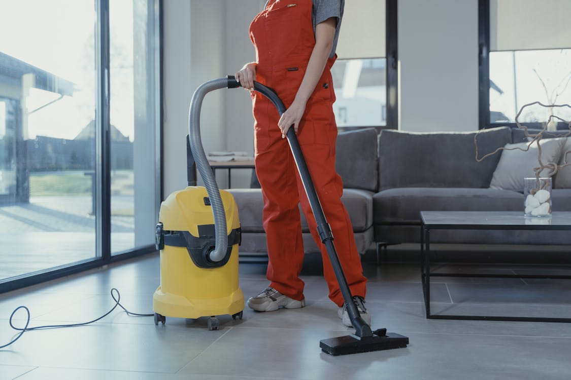 A person cleaning after junk hauling