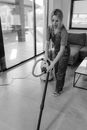 A Woman Cleaning Inside a House