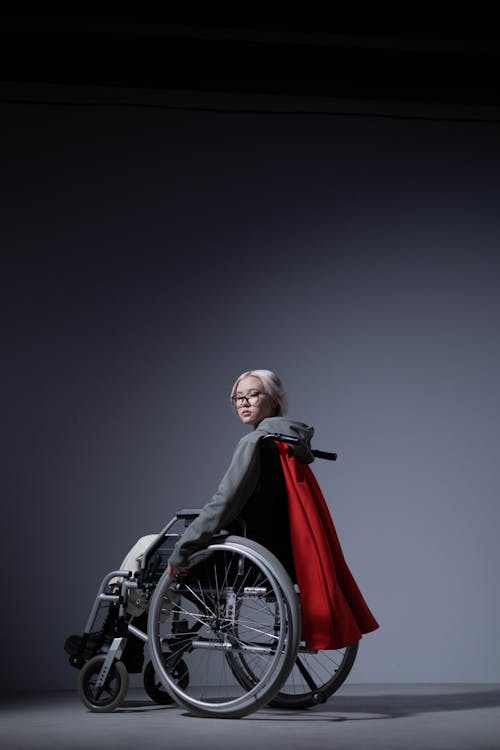 Free Person Sitting on a Wheelchair Stock Photo