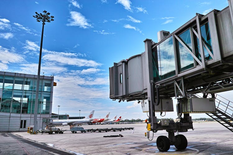 Planes And Jetway In Airport