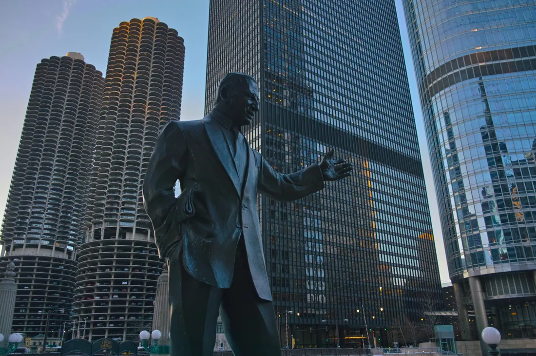 The 10 Best Places to Stay in Chicago (For Every Budget) 5 The Irv Kupcinet statue against Chicago skyscrapers, near The Publishing House in the West Loop