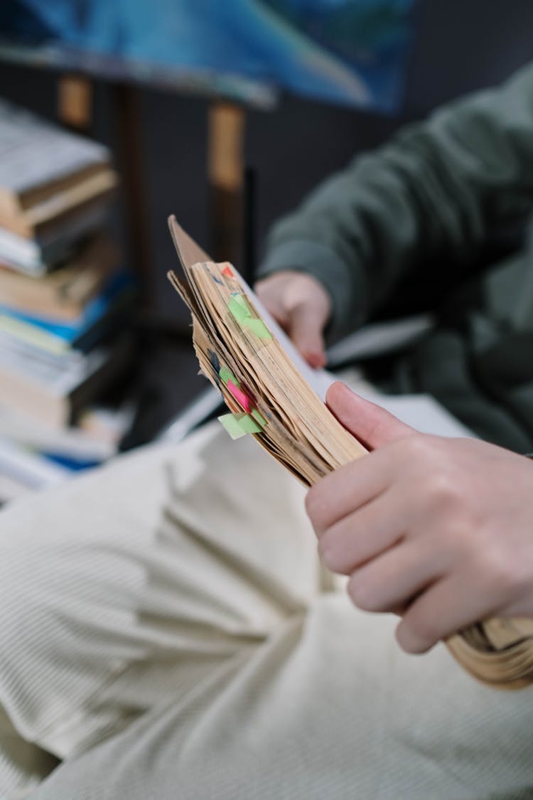 Person Holding A Book