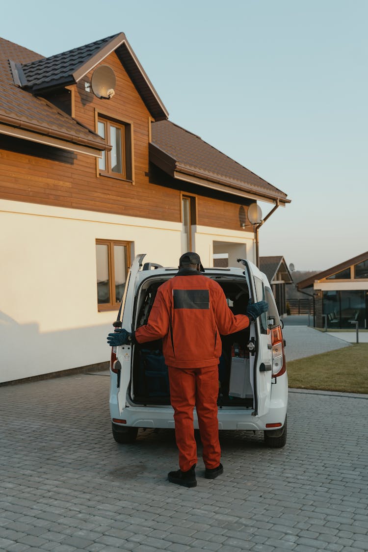 
A Man Closing A Van