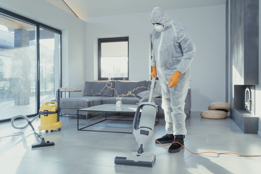 Specialist cleaning technician using professional cleaning equipment