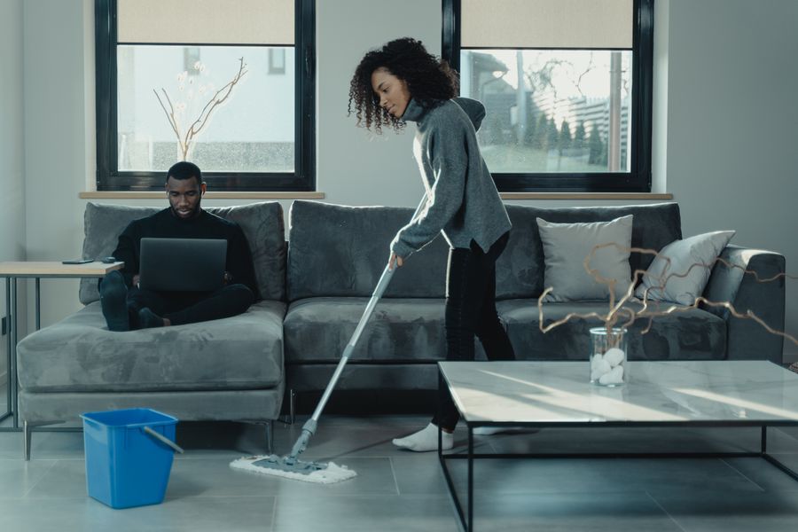 A cleaner refreshing the floor of a bright home
