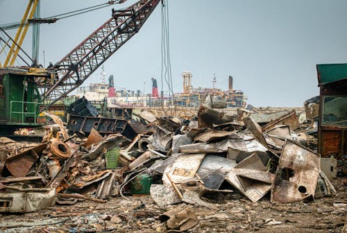 Pile of metal trash utilizing in junkyard