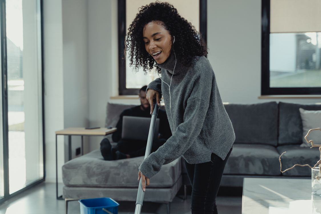 Woman Moping A Woman Mopping the Floor · Free Stock Photo