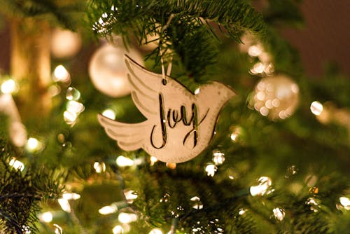 Dove Shape Ornament Hanging on a Christmas Tree