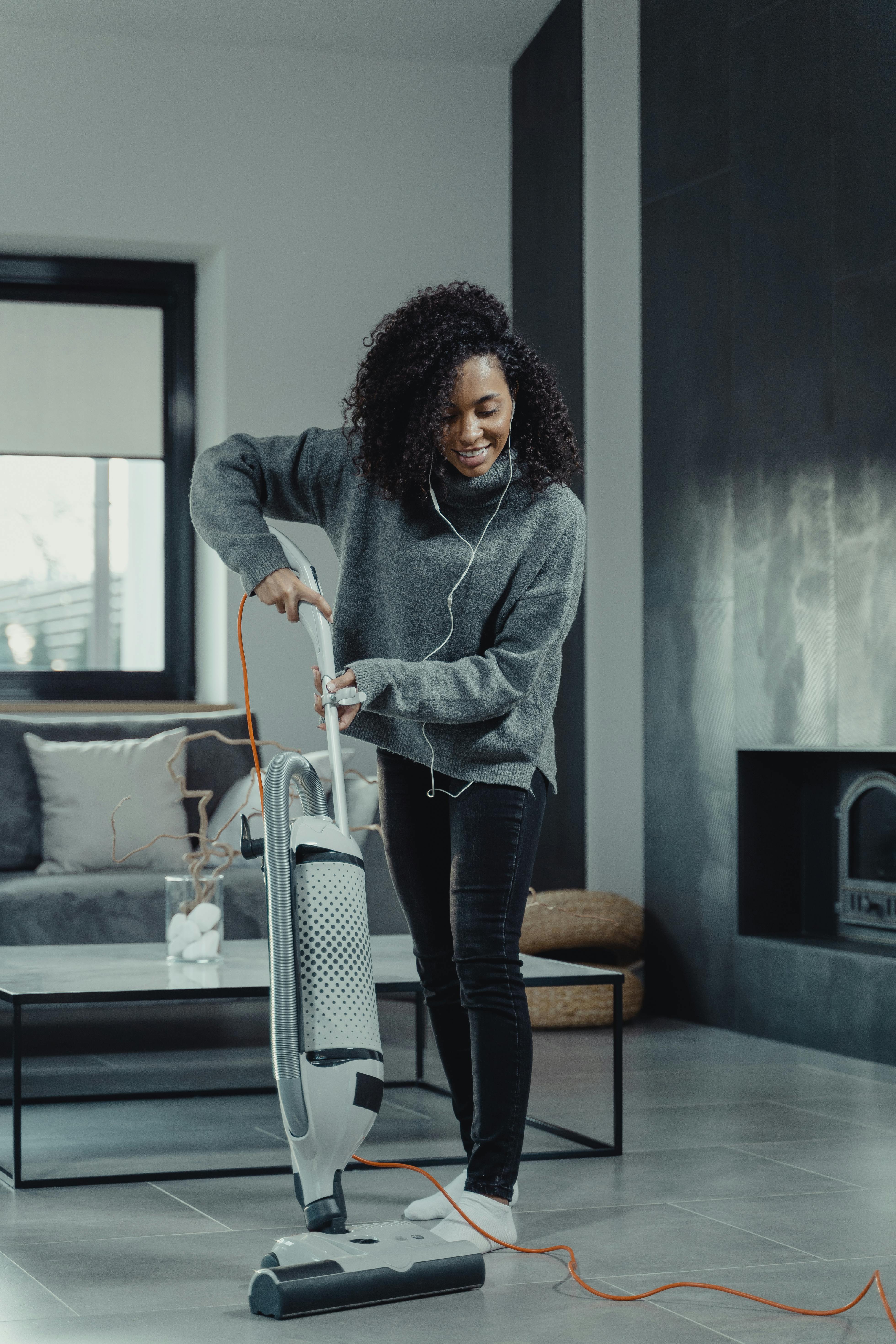 Woman with Cleaning Supplies in the Living Room Stock Photo - Image of  person, indoors: 51957938