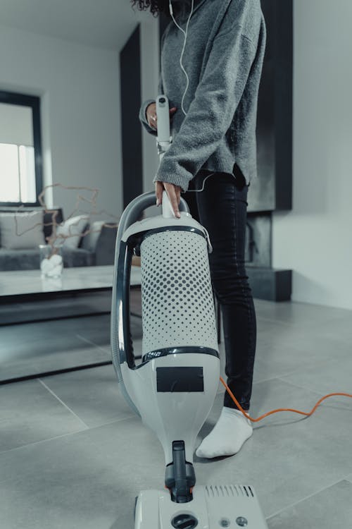Person Using a Vacuum Cleaner