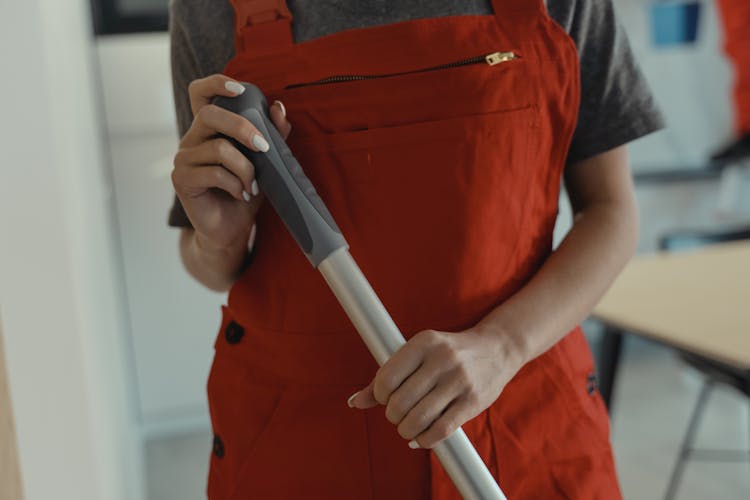 Person Wearing Orange Coveralls