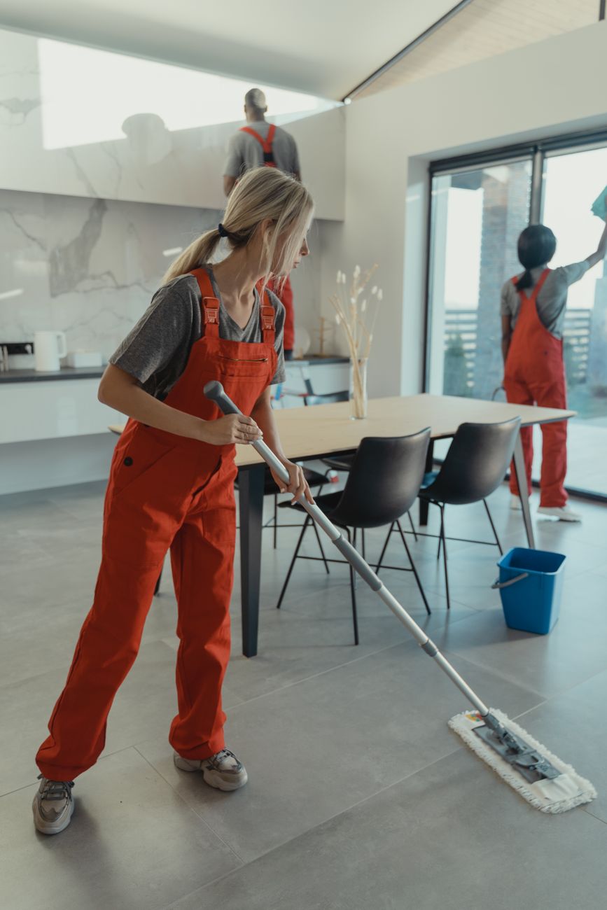 Professional cleaning crew working on a commercial cleaning contract