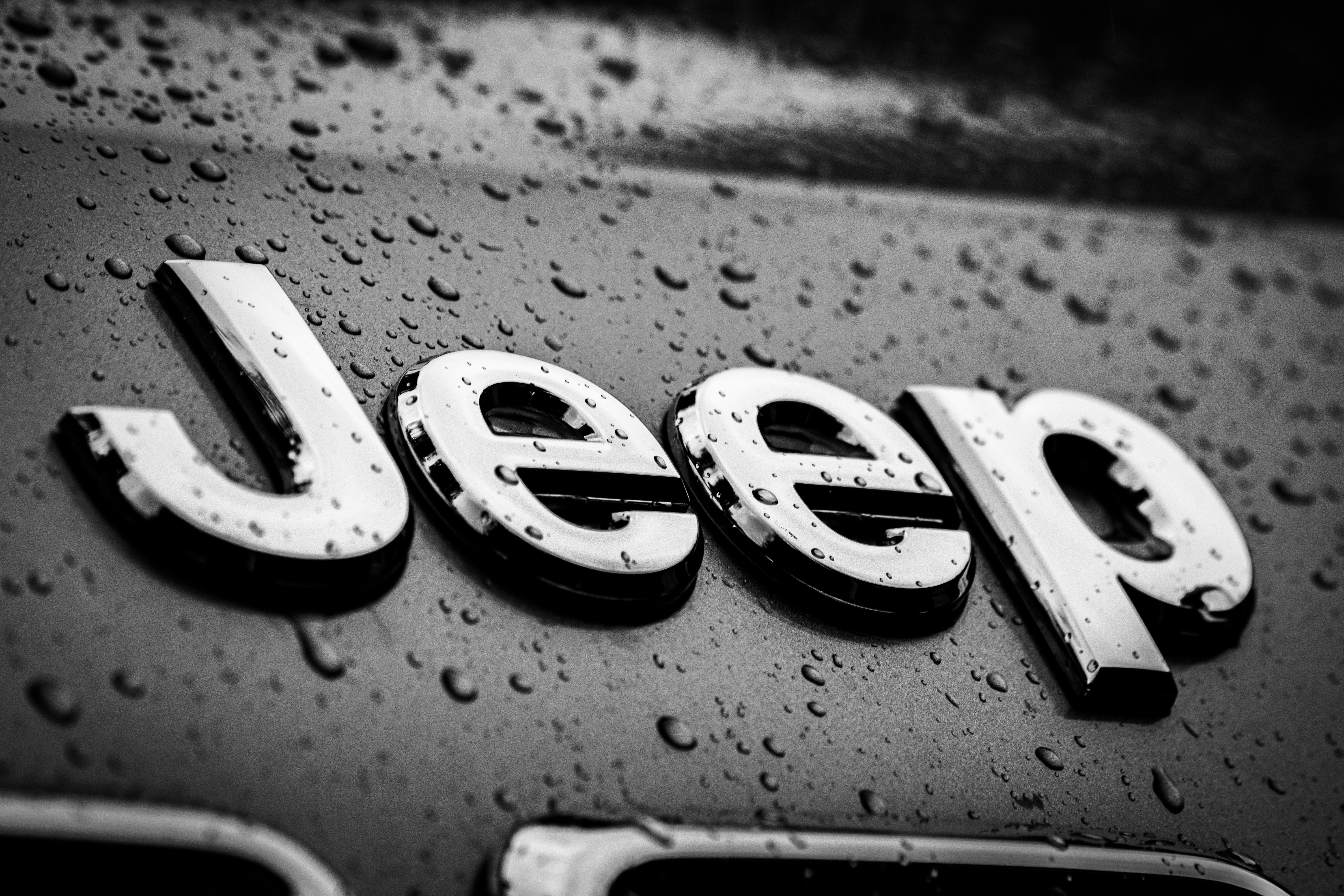 Jeep Logo Covered in Water Droplets · Free Stock Photo