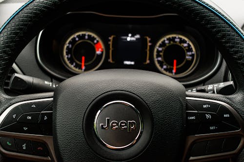 Close-Up Shot of a Black Steering Wheel