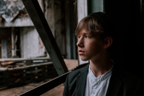 A Boy in Black Suit