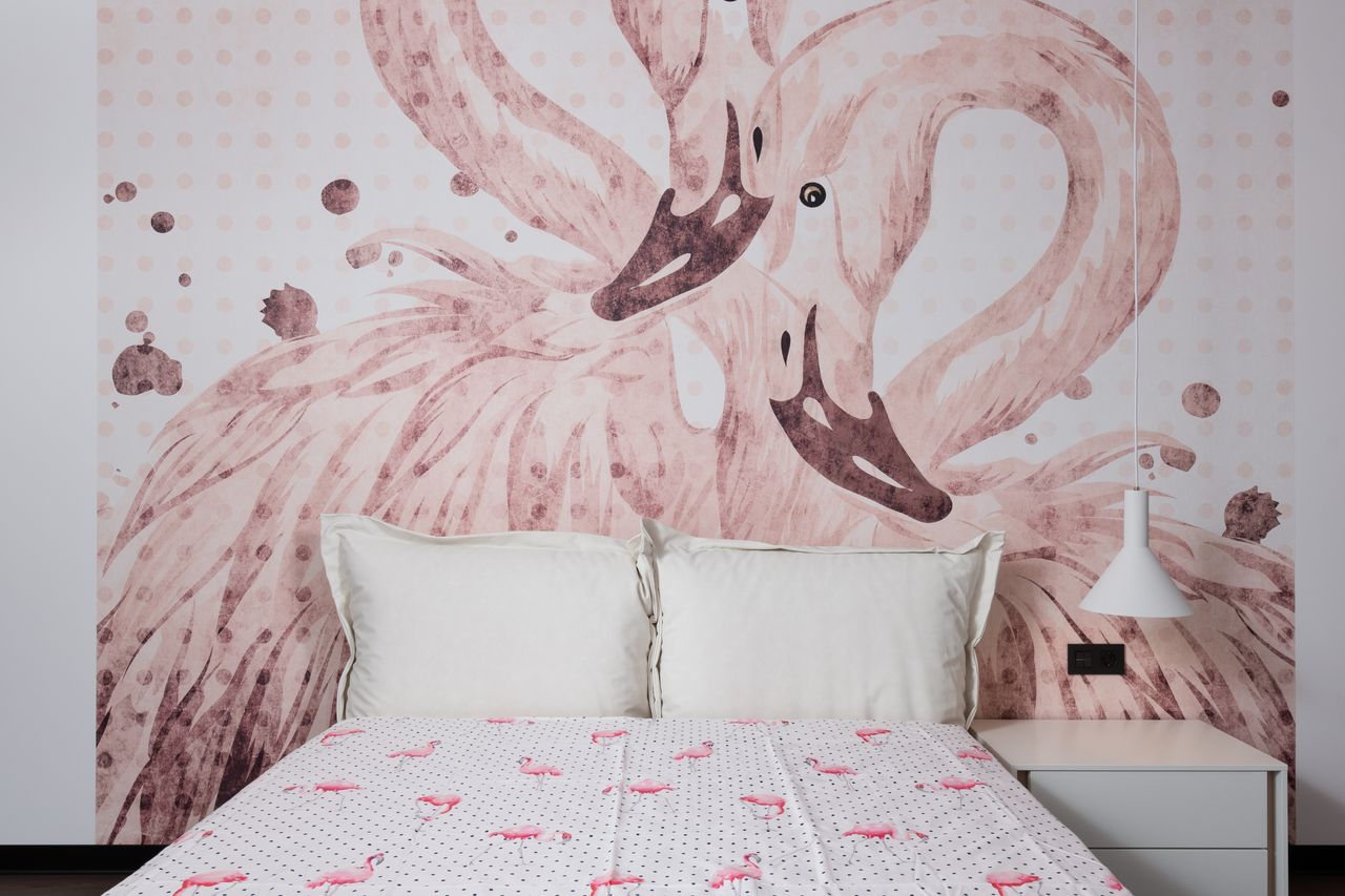interior of comfortable bedroom with painted walls near soft bed and b
