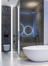 Interior of modern spacious bathroom with bright lamps