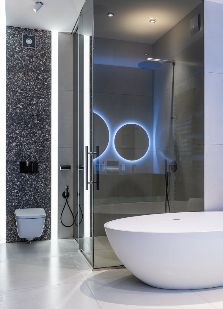 Interior Of Modern Spacious Bathroom With Bright Lamps