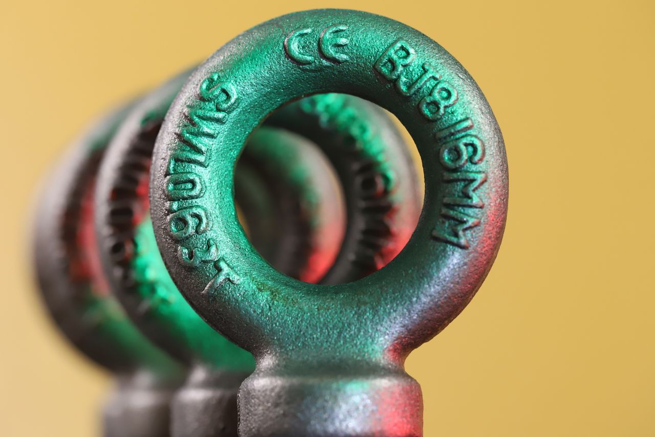 Round metal forged eye bolts used for lifting heavy applications