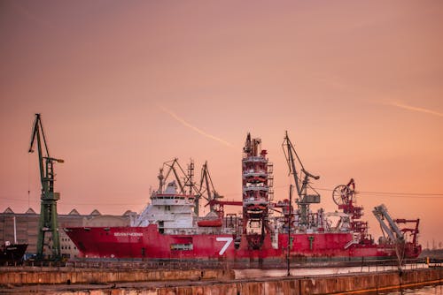 Photos gratuites de à quai, fret, grues